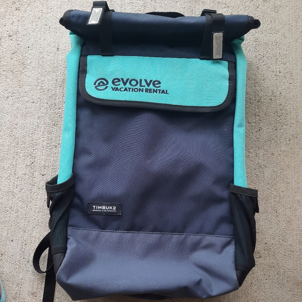 Timbuk2 Backpack Evolve Vacation Rental Logo